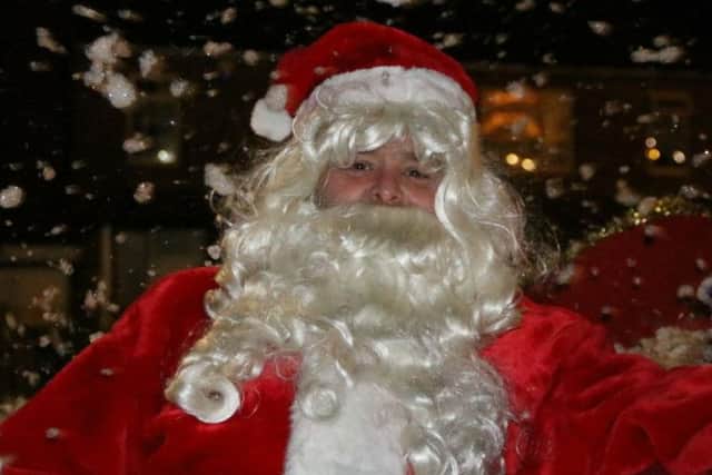 Santa took time out of his busy schedule to hand out chocolates