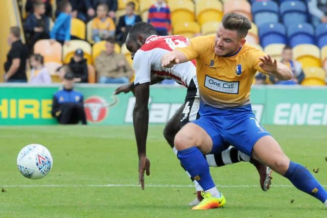 Mansfield Town v Exeter City.Alex MacDonald in first half action.