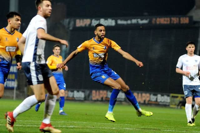 Mansfield Town v Bury.CJ Hamilton fires off another second half shot.