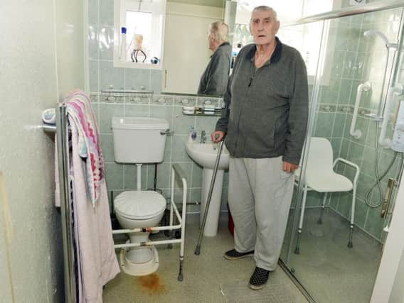 Brain Robinson, aged 79, has been left with a leaking toilet in his council bungalow for three years
