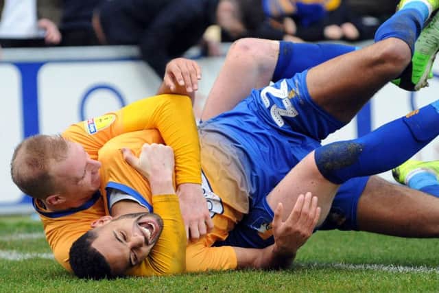 Mansfield Town v Notts County
CJ Hamilton celebrates his second goal with Neal Bishop.