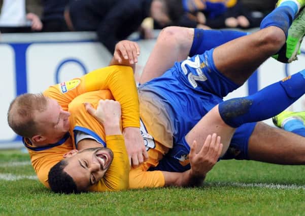 Mansfield Town v Notts County
CJ Hamilton celebrates his second goal with Neal Bishop.