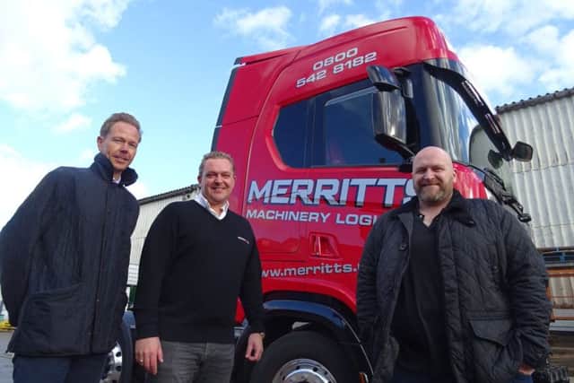 Merritts' bigwigs (from left) Alan Cundy, James Merritt and Rick Merritt celebrating a successful year.