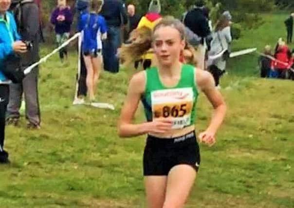 Caitlin Dodds in action for Mansfield Harriers.