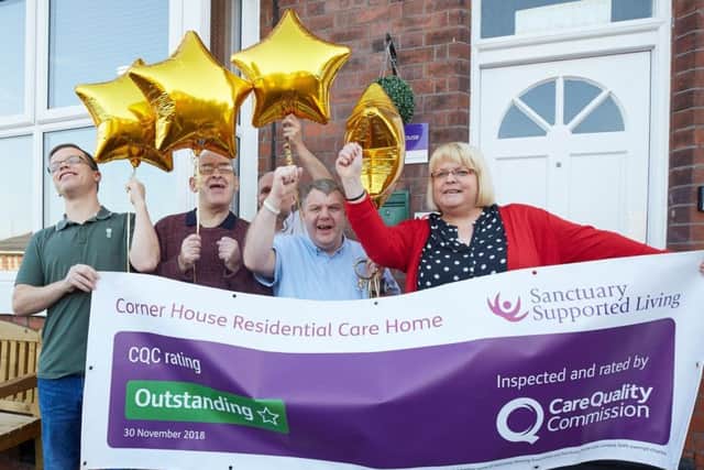 Manager Joanne Hardwick celebrates the rating with residents, from left, Warren Bailey, Tony Topley, Clive Medcalf and Clive Pickard. (PHOTO BY: Richard Tatham)