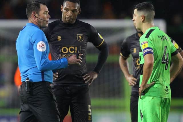 Picture by Gareth Williams/AHPIX.com; Football; Sky Bet League Two; Forest Green Rovers v Mansfield Town; 15/12/18  KO 15:00; The New Lawn; copyright picture; Howard Roe/AHPIX.com; Referee James Linington speaks to both captains as conditions worsened at The New Lawn