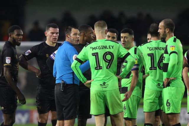 Picture by Gareth Williams/AHPIX.com; Football; Sky Bet League Two; Forest Green Rovers v Mansfield Town; 15/12/18 KO 15:00; The New Lawn; copyright picture; Howard Roe/AHPIX.com; Referee James Lingington asks Mansfield and Forest Green Rovers players if they wish to continue before abandoning the game at half time