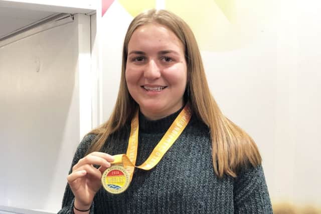 Lifesaver Ruth Moore with her gold medal.