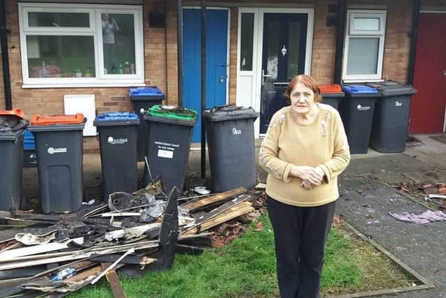 Resident Jasmine Clifford outside a  fire damaged flat on Willow Crescent  Sutton on December 29 2018.