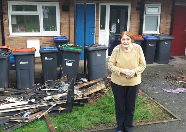 Resident Jasmine Clifford outside a  fire damaged flat on Willow Crescent  Sutton on December 29 2018.