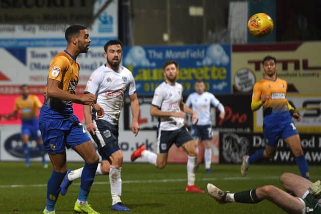 Picture Andrew Roe/AHPIX LTD, Football, EFL Sky Bet League Two, Mansfield Town v Bury, One Call Stadium, 26/12/18, K.O 3pmMansfield's CJ Hamilton heads his side infrontAndrew Roe>>>>>>>07826527594