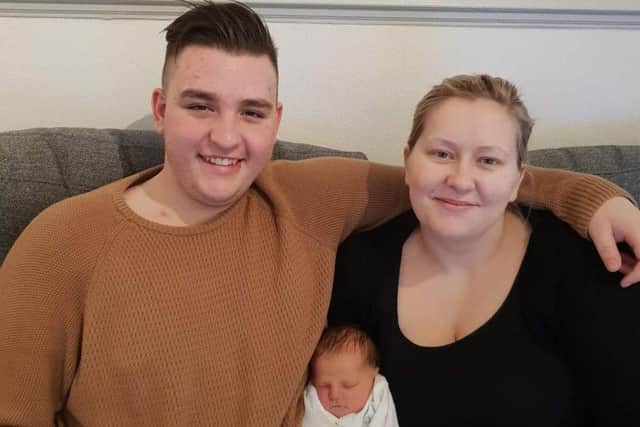 Jake, Katy and baby Zara.