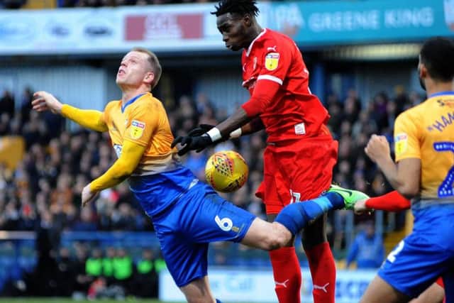 Neal Bishop in first-half action for Stags against Swindon.