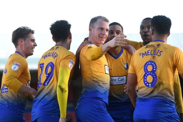 Picture Andrew Roe/AHPIX LTD, Football, EFL Sky Bet League Two, Grimsby Town v Mansfield Town, Blundell Park, 01/01/2019, K.O 1pmMansfield's Neal Bishop celebrates his goal with his teammatesAndrew Roe>>>>>>>07826527594
