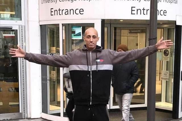 Travis being discharged from hospital.