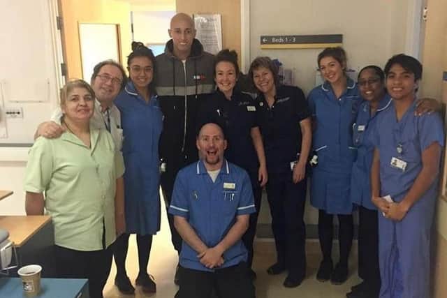 Travis with the hospital staff.