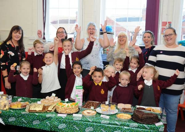 King Edwards pupils at a recent MacMillan coffee morning.