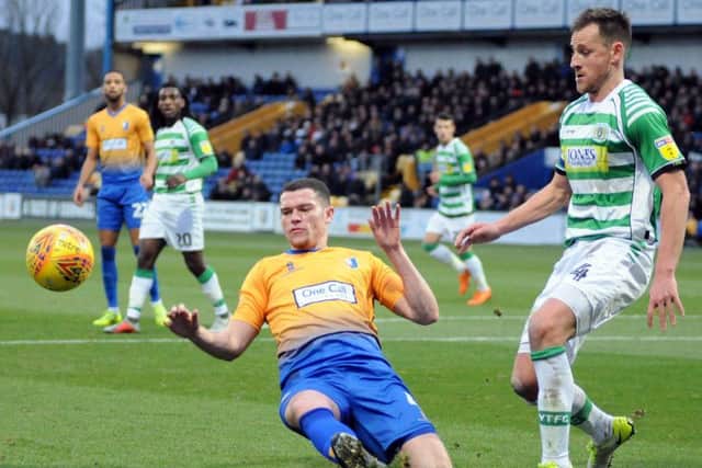Mansfield Town v Yeovil Town
Matt Preston tries to get on the end of a flick on header.