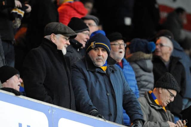 Mansfield Town fans during the 1-0 defeat to Yeovil. Can you spot a familiar face in the crowd? Pics by Anne Shelley.