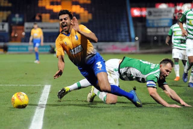 Mansfield Town v Yeovil TownMal Benning is brought down but didn't get the free kick.