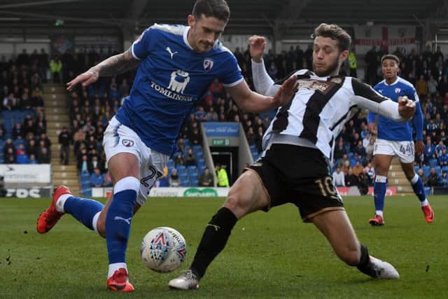 Mansfield Town's new loan signing, Jorge Grant (right), in action last season for Notts County against Chesterfield. (PHOTO BY: Andrew Roe/AHPIX Ltd).