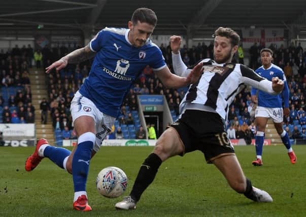 Mansfield Town's new loan signing, Jorge Grant (right), in action last season for Notts County against Chesterfield. (PHOTO BY: Andrew Roe/AHPIX Ltd).