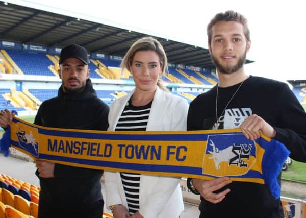 New signings Jorge Grant (right) and Nicky Ajose with Stags' chief executive Carolyn Radford.