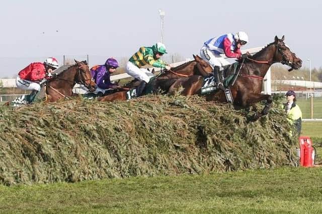 One For Arthur on his way to victory in the 2017 Randox Health Grand National at Aintree.