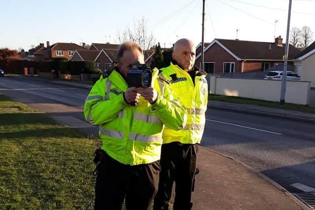 Sherwood Policeconducted vehicle speed checkson Lower Kirklington Road, Southwell with a hand held speed gun.