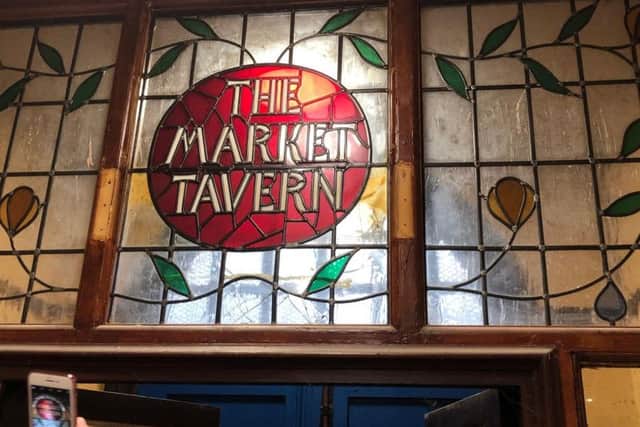 The stained glass window has been left intact during the renovation, to keep the pub's heritage