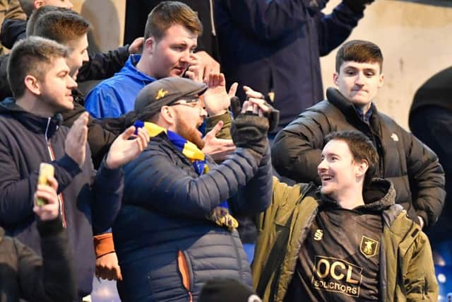 Stags fans celebrate after the game.