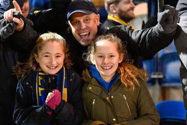 Excited Stags fans at the final whistle.