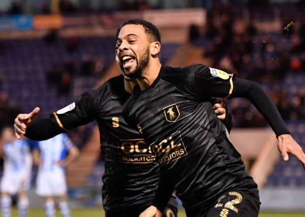 Mansfield Town's CJ Hamilton celebrates after scoring to put the Stags 3-2 up: Picture by Steve Flynn/AHPIX.com, Football: Skybet League Two  match Colchester United -V- Mansfield Town at JobServe Community Stadium, Colchester, Essex, England on copyright picture Howard Roe 07973 739229