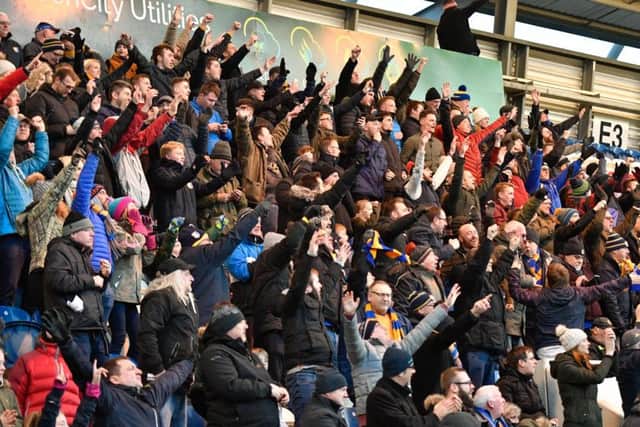 Stags fans celebrate their second goal: Picture by Steve Flynn/AHPIX.com, Football: Skybet League Two  match Colchester United -V- Mansfield Town at JobServe Community Stadium, Colchester, Essex, England on copyright picture Howard Roe 07973 739229