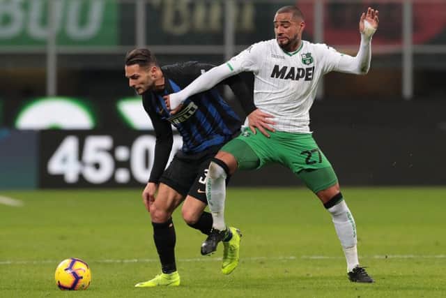 Kevin Prince Boateng (R) in action for US Sassuolo.  (Photo by Emilio Andreoli/Getty Images)