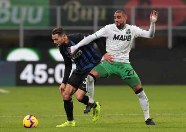 Kevin Prince Boateng (R) in action for US Sassuolo.  (Photo by Emilio Andreoli/Getty Images)