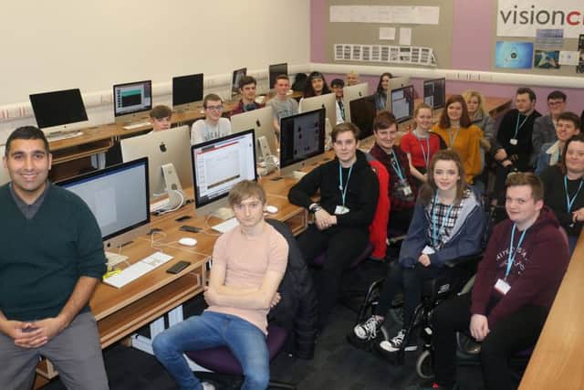 Gogglebox star Baasit Siddiqui with students at West Nottinghamshire College.