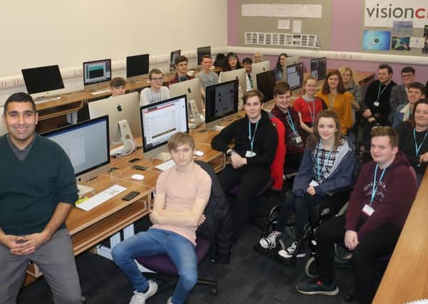 Gogglebox star Baasit Siddiqui with students at West Nottinghamshire College.