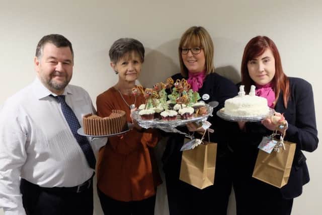 A bake-off was one of the fundraising activities staff at Specsavers in Suton took part in
