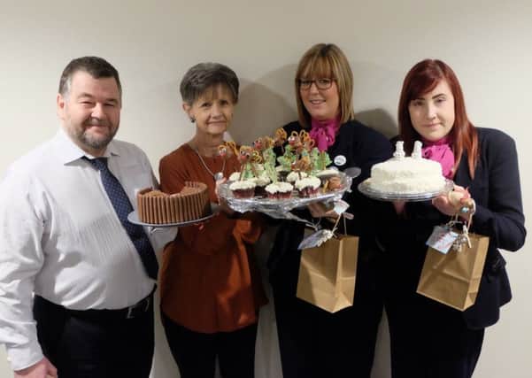 A bake-off was one of the fundraising activities staff at Specsavers in Suton took part in