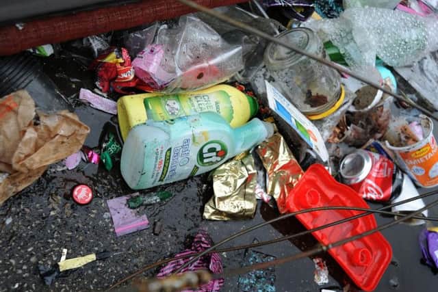The rubbish strewn ally-way between Victoria Street and Moor Street homes.