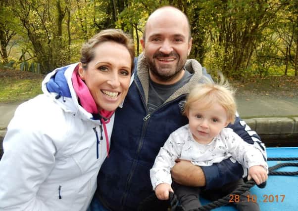 Watersports enthusiasts Richard and Katie Hill, with their two-year-old daughter, Jessica.