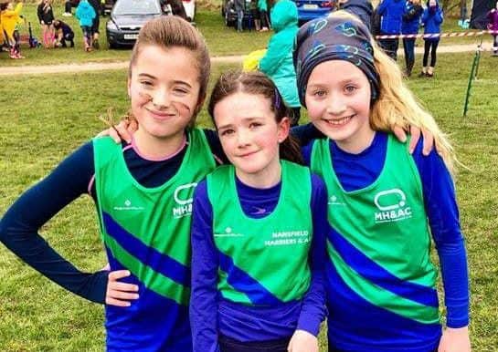 Mansfield Harriers successful U11 girls trio, from left, Isabel Westwood, Freya Longmead and Amelia Arbon.
