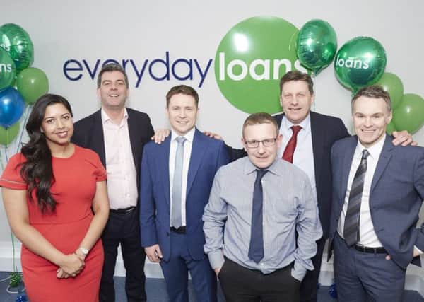 Branch manager Daniel de Quincey (third left), managing director Jon Wiggins (second left) and the Everyday Loans team at Mansfield.