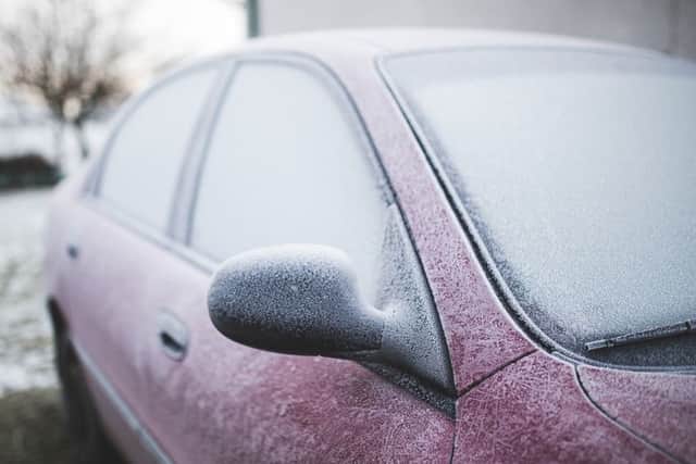 Frozen car. Photo by Pixabay.