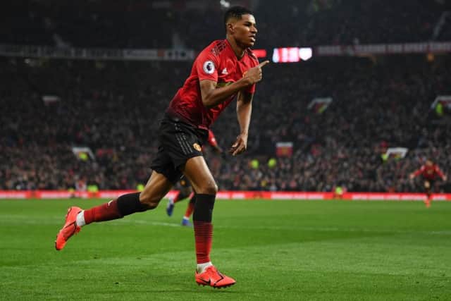 MANCHESTER, ENGLAND - JANUARY 19: Marcus Rashford of Manchester United celebrates after scoring his sides second goal during the Premier League match between Manchester United and Brighton & Hove Albion at Old Trafford on January 19, 2019 in Manchester, United Kingdom. (Photo by Gareth Copley/Getty Images)