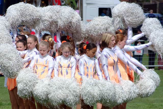 2003: A fabulous shot taken mid-routine as this talented group performs at the Kirkby Spring Carnival. Did you go to this event?