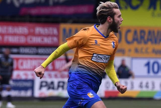 Jorge Grant celebrates making it 1-0.