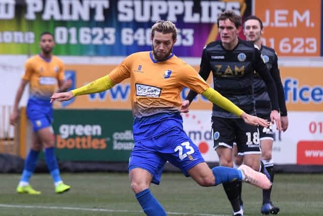 Mansfield's Jorge Grant scores the opening goal.