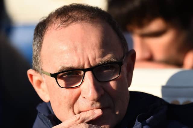 Martin O'Neill looks on.